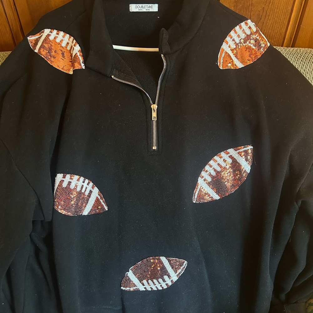Black Zip Up Sweater with Football Design